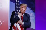 Trump-CPAC2019-hug-flag-600x400-1.jpg