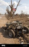a-tornado-damaged-vehicle-with-the-stars-and-stripes-in-greensburg-AH4BBJ.jpg